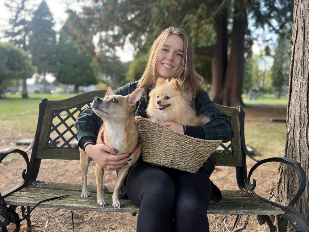 Jessica hiking with her dogs